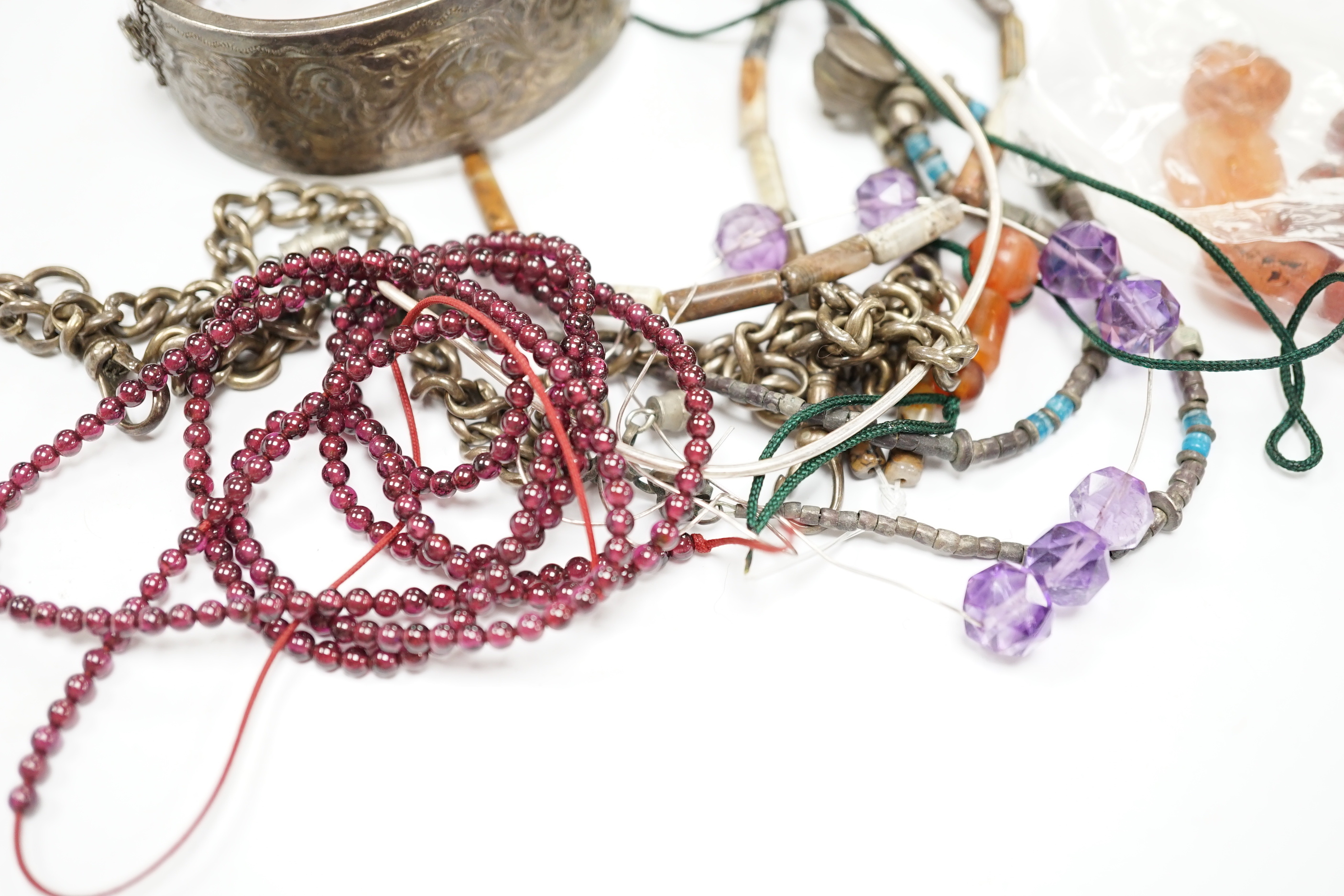 A modern silver hinged bangle and a quantity of mixed jewellery including fittings, bead necklaces, cufflinks, rings, silver albert etc.